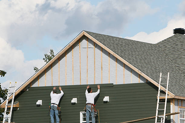 Professional Emergency Siding Repair technician working in Bostic, NC